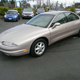 Illustration for article titled At $3,900, Could This 1999 Olds Aurora Be An Awe Inspiring Sight?